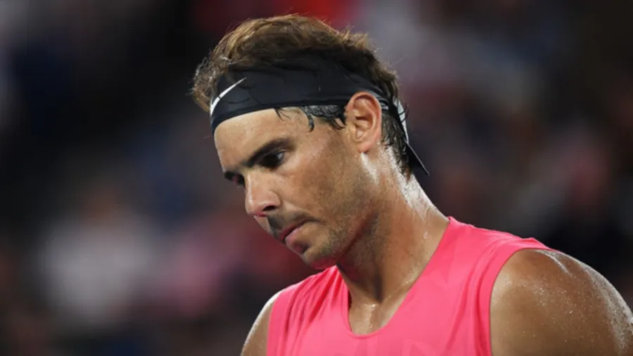 Why do Tennis players wear Headbands